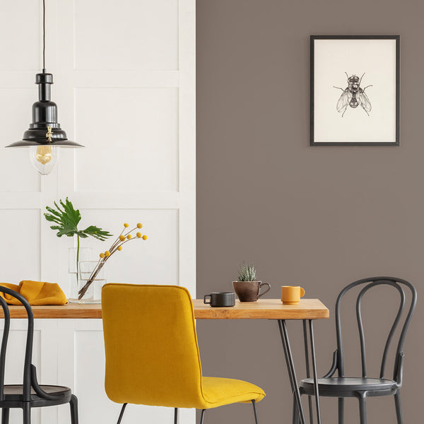 A breakfast room decorated with After the Storm, one of Zhoosh Paint's darkest greys that gives real depth.