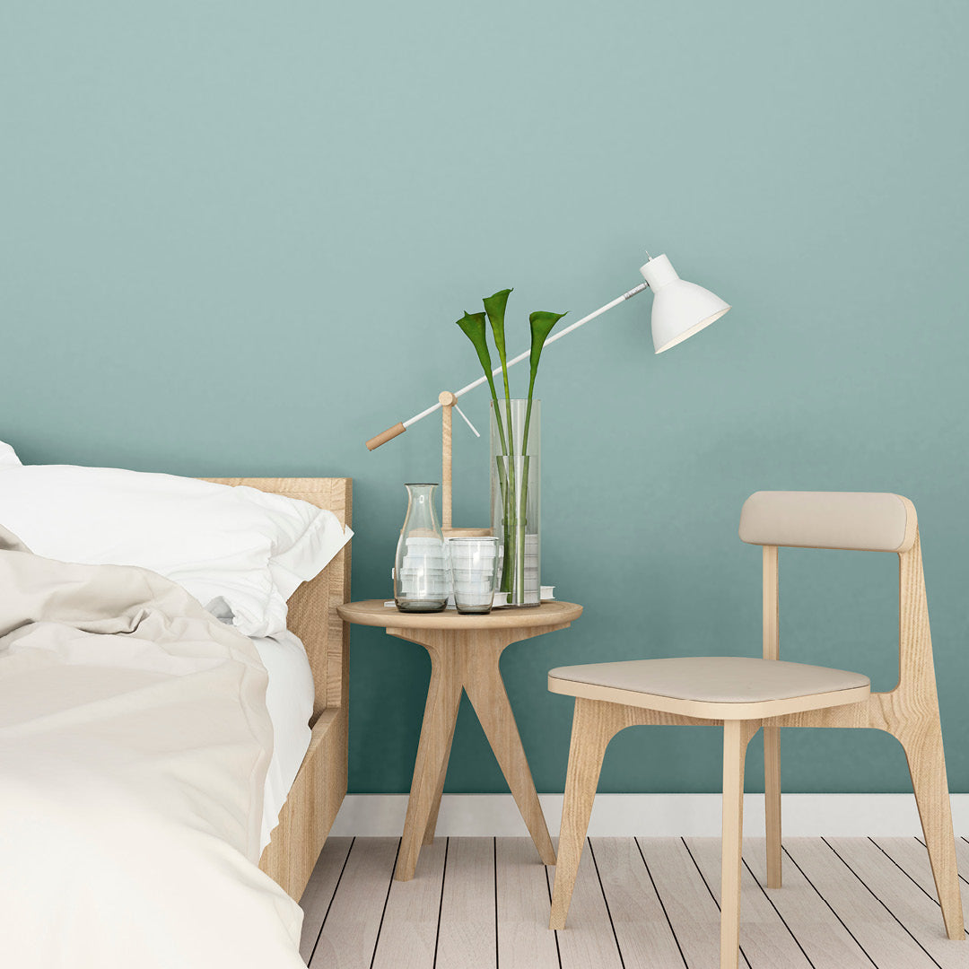 Minimalist bedroom decorated with Cabin by the Beach, a light blue paint from Zhoosh.