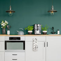 Modern kitchen decorated in In The Canopy, a rich green paint from Zhoosh.