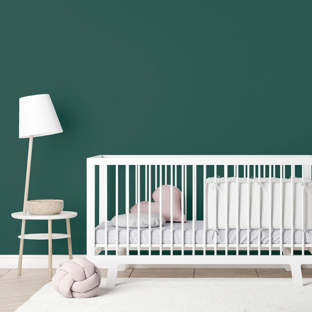 Nursery decorated in In The Canopy, a rich green paint from Zhoosh.