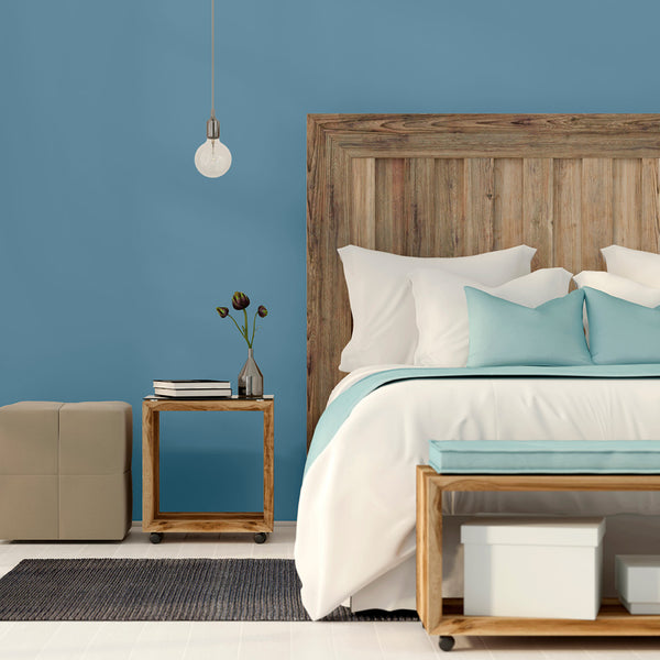 Minimalist, modern bedroom decorated in Morning Dip, a blue slate paint from Zhoosh.