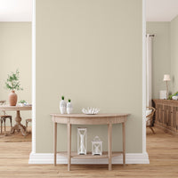 Living room and reception area decorated in Morning Porridge, a dark beige paint from Zhoosh.