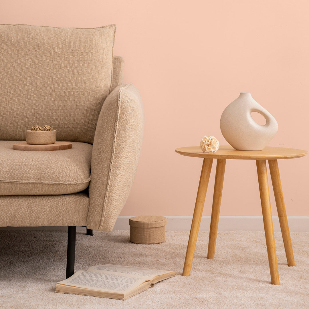 Living room decorated in Peony, a peachy pink paint colour from Zhoosh.