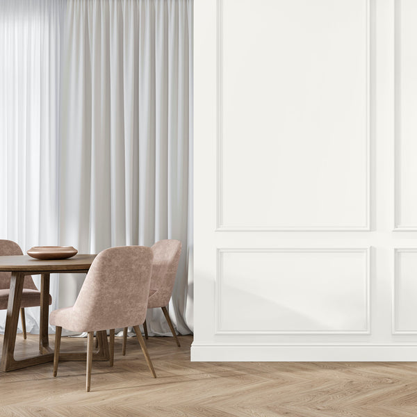 A dining area decorated with Snowdrop, a pale grey-white paint from Zhoosh Paints.